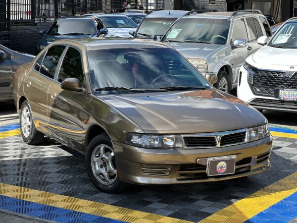 MITSUBISHI SIGNO GLX 2009 MARRON - Imagen 17