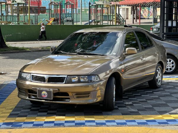 MITSUBISHI SIGNO GLX 2009 MARRON - Imagen 14
