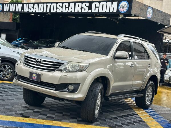 TOYOTA FORTUNER SR 2013 DORADO - Imagen 12